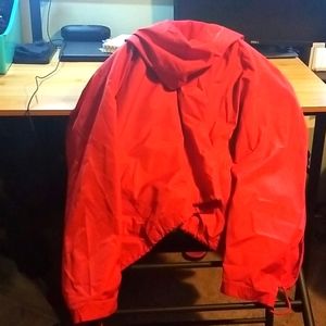 Red windbreaker